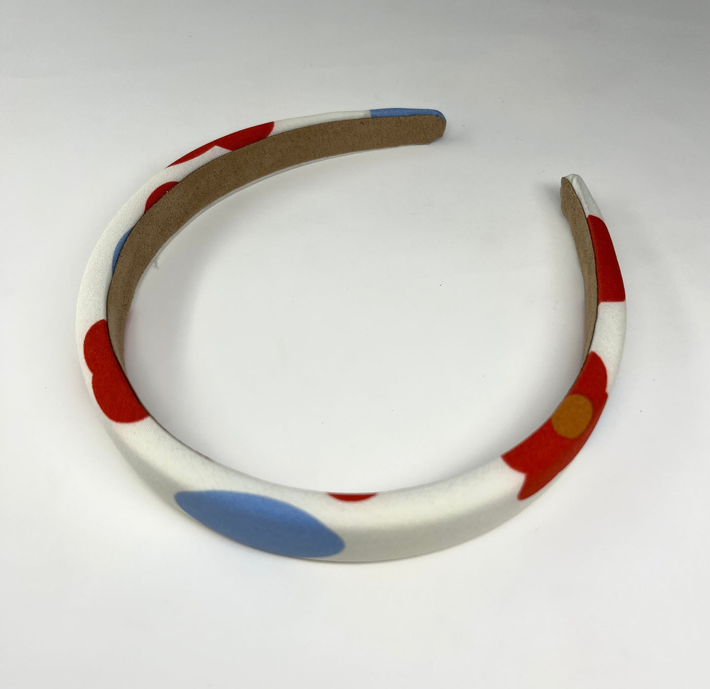 Headband- White with blue ovals and red flowers