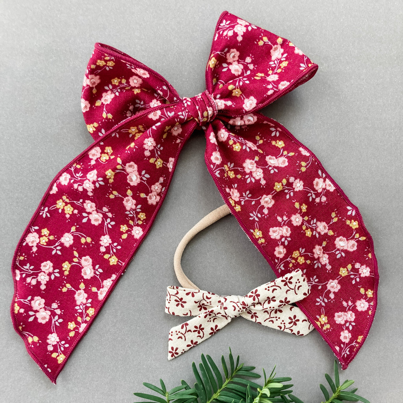 Holiday 2021 hair bow collection with burgundy and ivory floral hair bows