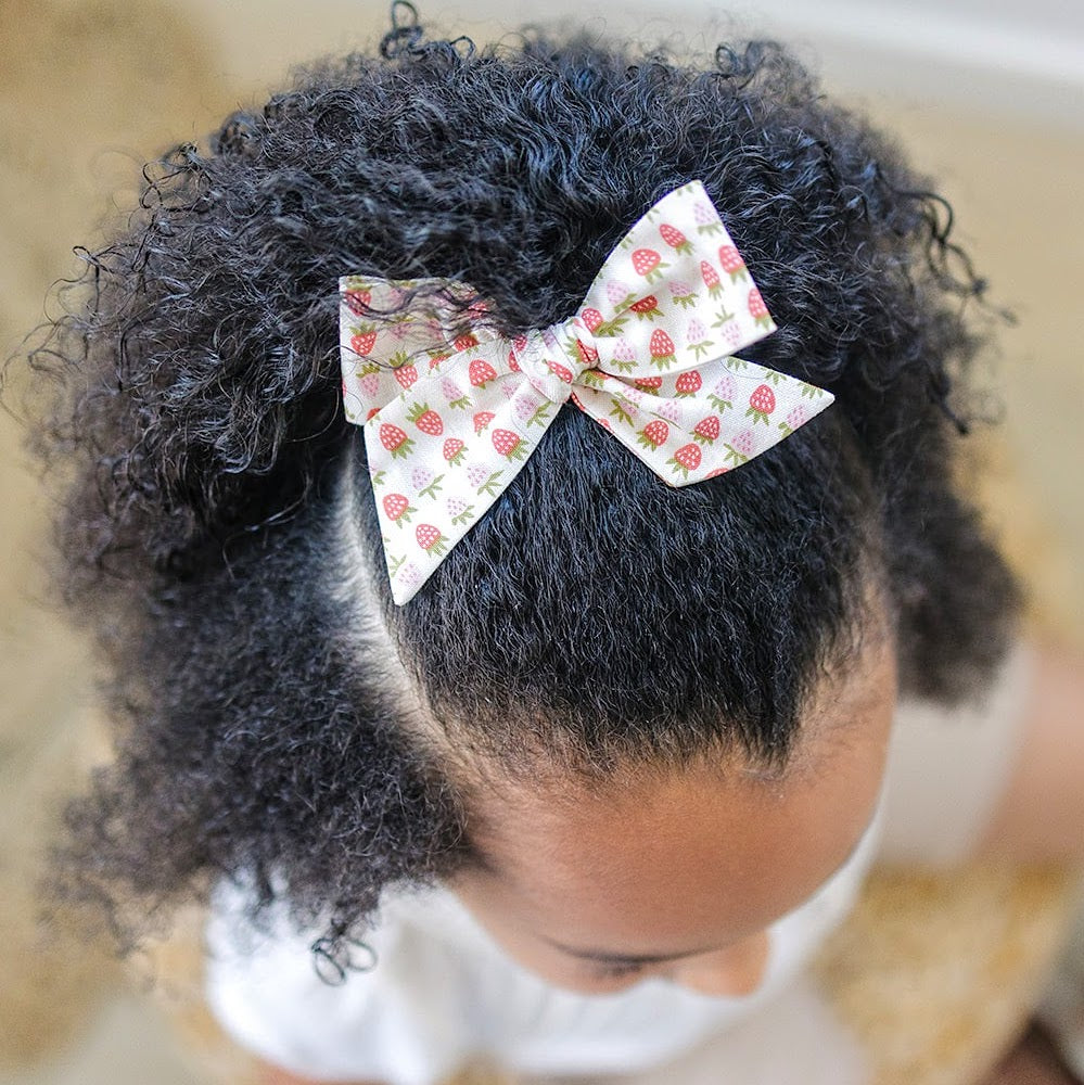 Girls hair bow with strawberries