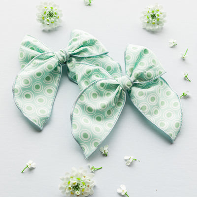 light green patterned hair bow