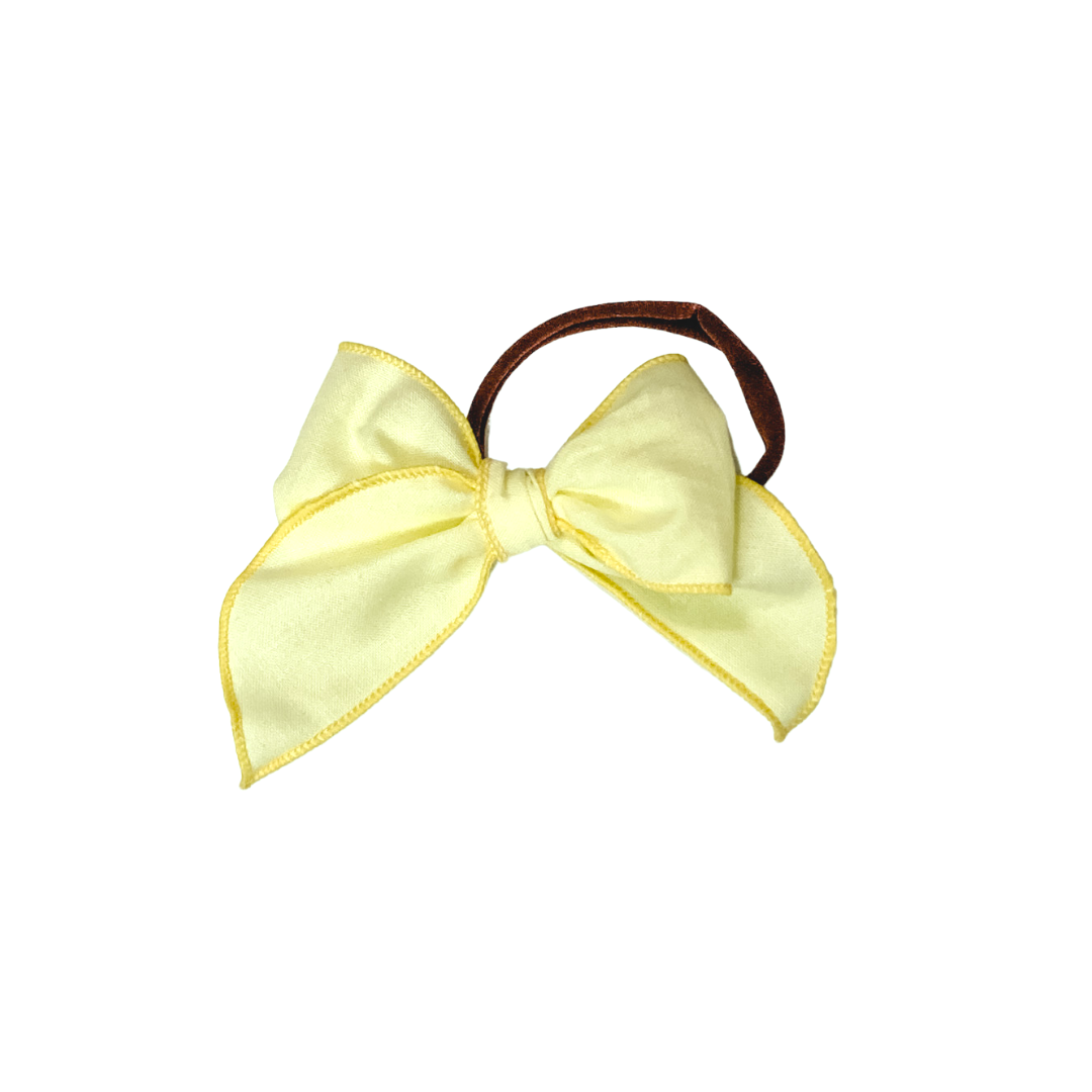 girls yellow hair bow