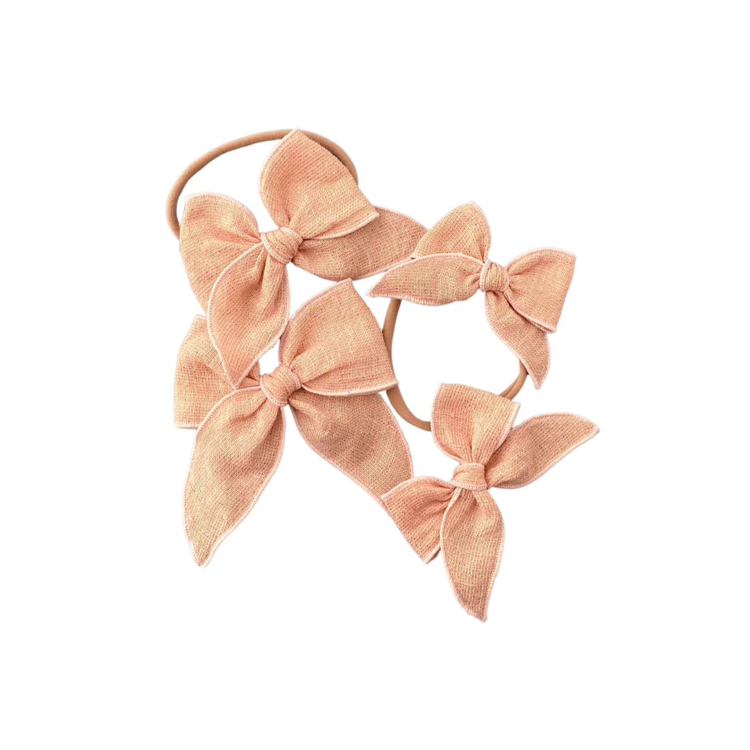 shimmery peachy pink hair bow clips and headbands